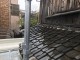 葺き替え前の下屋根と張替え前の外壁