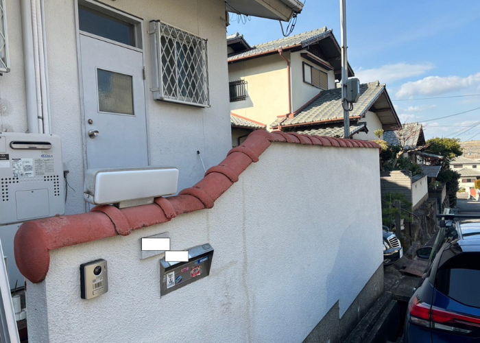 茨木市　剥がれが酷い擁壁への塗装工事が完了した後の様子